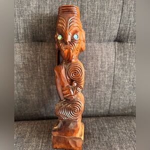 Carved Māori wooden warrior